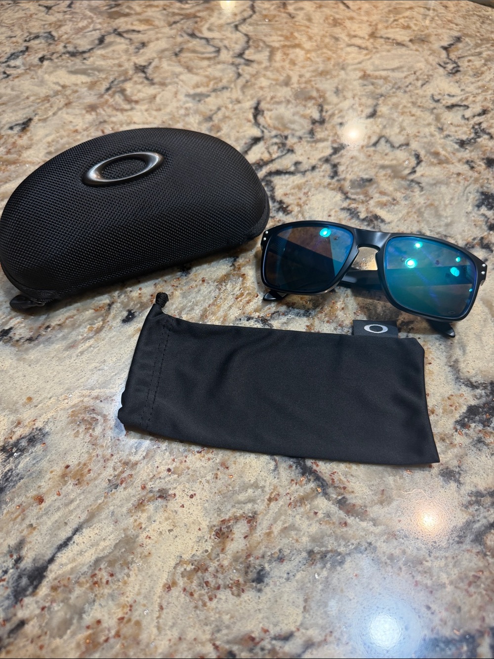 Oakley Men’s Black Frame Sunglasses with Blue Lenses